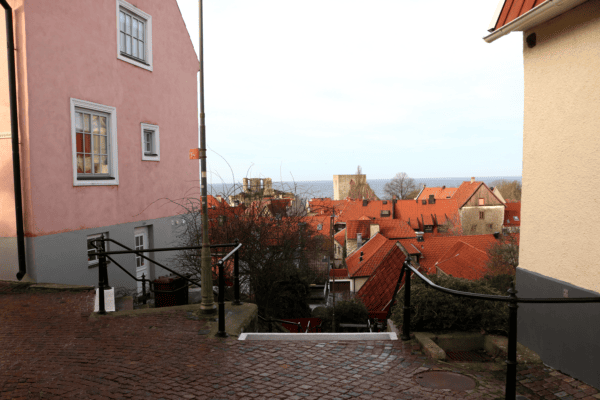 The view from the top of the stairs at Finntrappan. Below you can see the red roofs of all the little cottages, and the ocean beyond them.